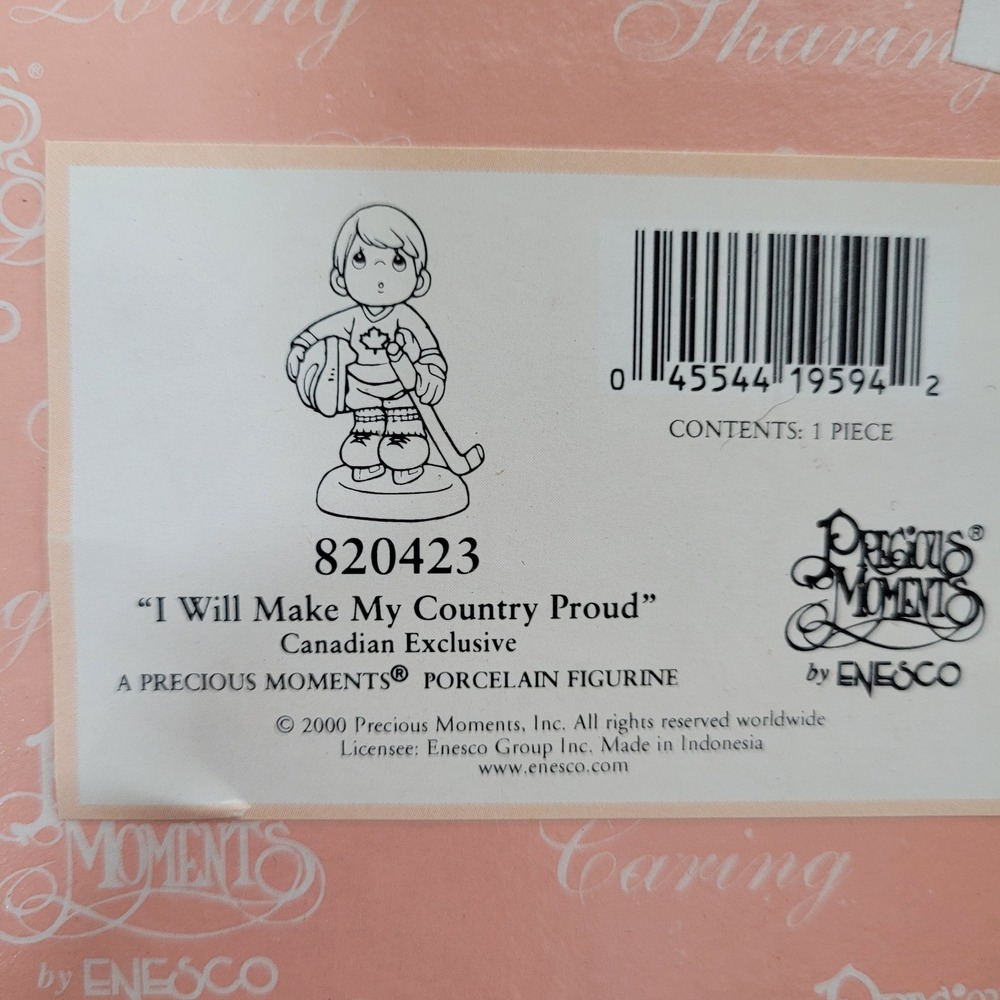 Precious Moments 820423 I Will Make My Country Proud Canadian Hockey Figurine
